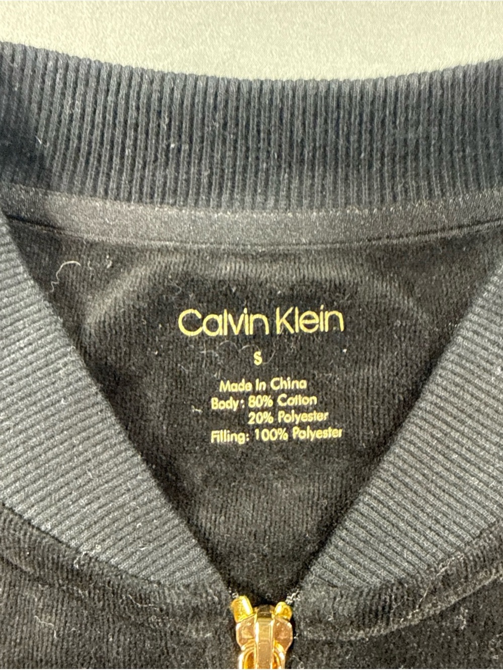 Calvin Klein womrns’s Black Zip-Up Sweater with Gold Hardware
